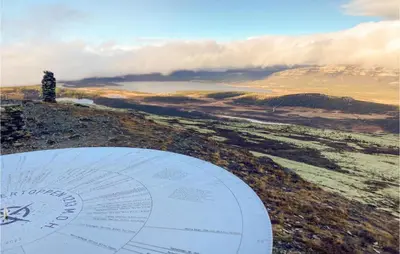 a view from the top of a hill with a clock at Awesome Home In Kvam With Sauna in Kvam