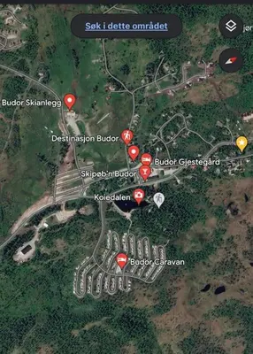 a map of a city with red dots at Høstkos og ro på Budor, 4 roms hytte med peis og wifi in Nordset