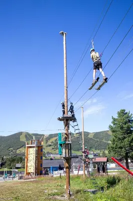 a person on skis jumping off a power line at Large cabin with spectacular views in Geilo in Geilo