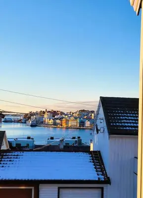 a view of a body of water with a city at Ksu Nordlandet leiligheten in Kristiansund