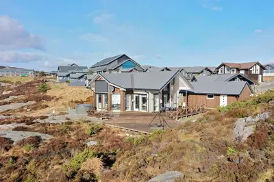 a house on top of a hill at Fjordcabin Panoramic view Near Bergen 3 sleepingroom in Forland