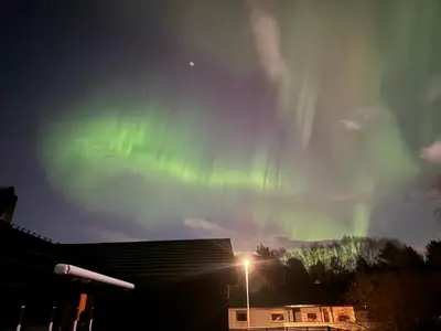 an image of the northern lights in the sky at Ekskluzywny hybel w zaciszu in Kristiansund
