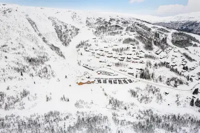 an aerial view of a resort in the snow at Leilighet - Panorama view - Sogndal Skisenter Hodlekve in Sogndal