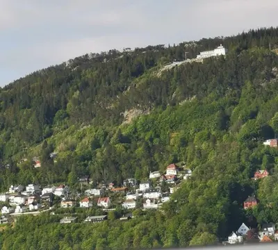a small town on the side of a mountain at Spacious and Beautiful Apartment in Bergen with free parking in Bergen