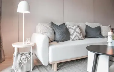 a living room with a white couch and a table at Gorgeous Home In Bjorli With Wifi in Bjorli