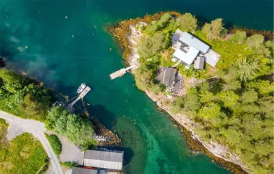 an aerial view of a house on an island in the water at 4 Bedroom Lovely Home In Skodje in Skodje