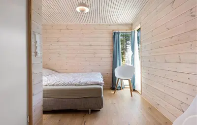 a small bedroom with a bed and a window at 4 Bedroom Lovely Home In Skodje in Skodje