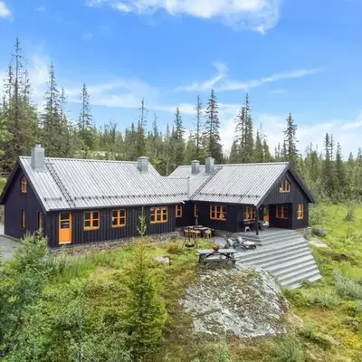 Your Ideal Getaway Awaits in This Charming Cabin Retreat