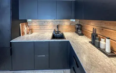 a kitchen with blue cabinets and a sink at 3 Bedroom Gorgeous Home In Bjorli in Bjorli