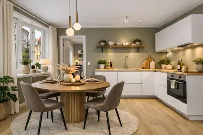 a kitchen and dining room with a table and chairs at Modern apartment in the heart of Bergen in Bergen
