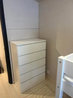 a closet with white drawers and a sink at Hyt leilighet med 2 soverom in Bjorli