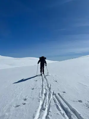 a person cross country skiing in the snow at Sveheim - cabin with an amazing view in Flå