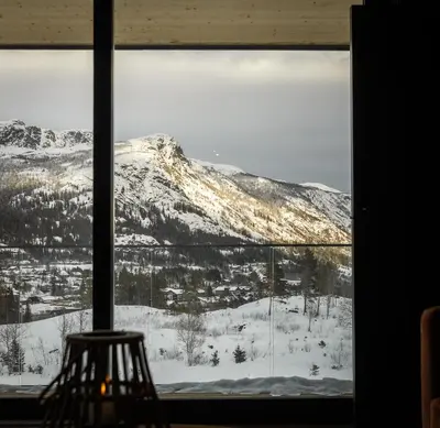 a window with a view of a snow covered mountain at Vister, Hemsedal - fine leiligheter rett ved Fyri Resort - Ski inn - Ski out in Hemsedal
