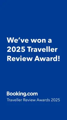 a blue sign that says weve won a traveler review award at Rett ved Raudalen Alpinanlegg in Beitostøl