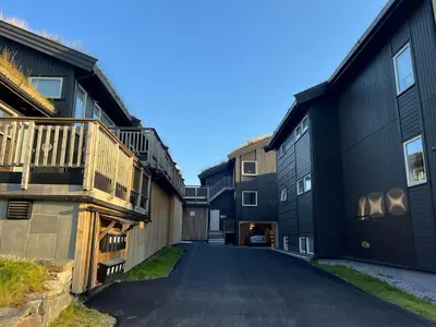 an empty street in a row of buildings at Sentral leilighet på Geilo in Geilo