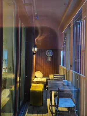 a room with a table and a table and chairs at Ny og moderne leilighet, midt i byen1 in Trondheim