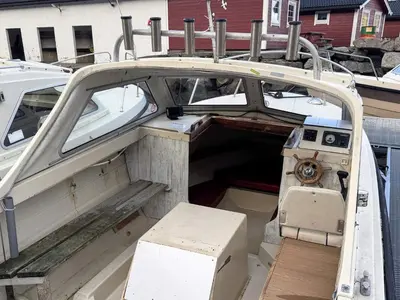 a boat with its door open in a dock at 3 person holiday home in Flatraket-By Traum in Barmen