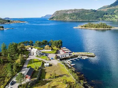 an aerial view of a house on an island in a body of water at 8 person holiday home in Flatraket-By Traum in Barmen