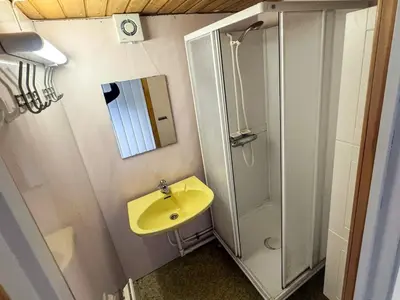 a bathroom with a sink and a shower at 8 person holiday home in Flatraket-By Traum in Barmen