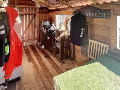 a room with a cabin with wooden floors and a room with a bike at 6 person holiday home in Dalsøyra-By Traum in Dalsøyra