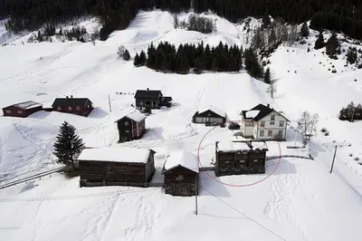 a group of buildings in the snow on a mountain at Trevet by Norgesbooking - cabin close to skicenter in Ål