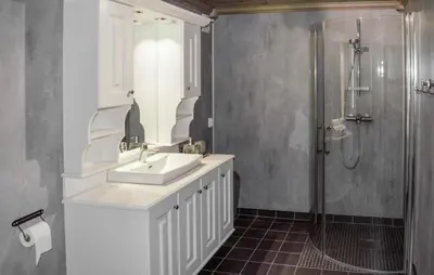 a bathroom with a sink and a shower at 4 Bedroom Nice Home In Engerdal in Kvisla