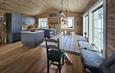a kitchen with a long wooden table in a room at Stunning Home In Eggedal With Wifi in Eggedal