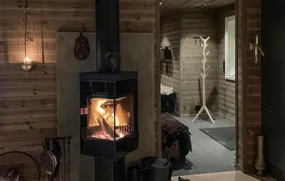 a woodburning stove in a living room with at Stunning Home In Eggedal With Wifi in Eggedal