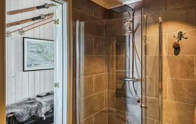 a shower with a glass door in a bathroom at Gorgeous Home In Rjukan With Kitchen in Rjukan