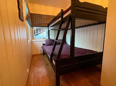 a couple of bunk beds in a room at Leilighet i Uvdal med nydelig utsikt in Sønstebø