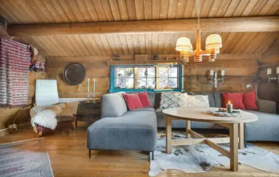 a living room with a couch and a table at 3 Bedroom Amazing Home In Gol in Gol