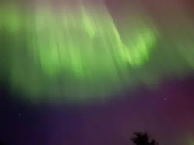an image of the northern lights in the sky at Krokenes in Sylte