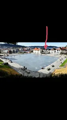 a large pool of water with a red object in it at Byleilighet nær Fløyen in Bergen