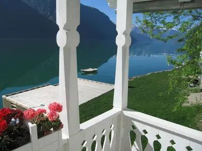 a view from a balcony with a view of the water at 