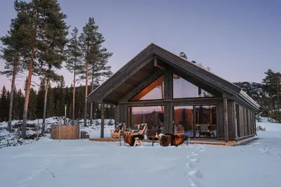 a small cabin in the snow in the woods at Nesfjellet in Nes i Ådal