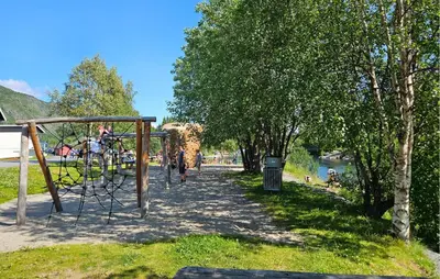 a park with a playground with people walking on it at Pet Friendly Apartment In Hemsedal in Hemsedal