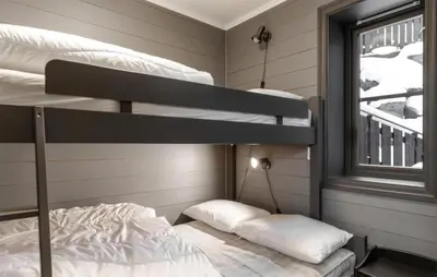 a room with two bunk beds and a window at 3 Bedroom Nice Apartment In Hemsedal in Hemsedal