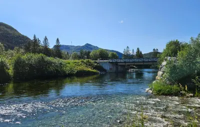 a bridge over a river next to a mountain at 3 Bedroom Nice Apartment In Hemsedal in Hemsedal