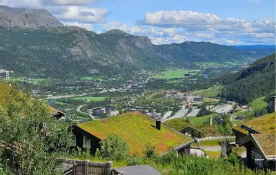 a view of a valley with a town and mountains at 2 Bedroom Cozy Apartment In Hemsedal in Hemsedal