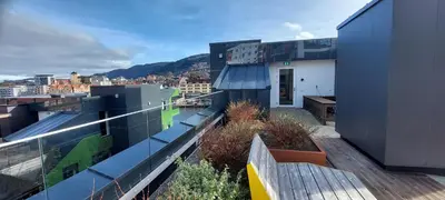 a view of a building from a balcony at Bergen city apartment in Bergen