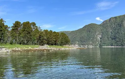 a view of a river with mountains in the background at Gorgeous Apartment In Eresfjord in Nauste