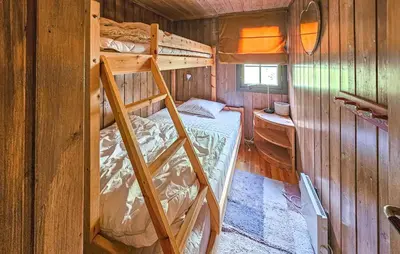 a bedroom with two bunk beds in a cabin at Beautiful Home In Gol With Kitchen in Gol