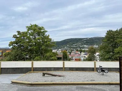 a motorcycle parked on top of a building at Høyegaarden in Bergen