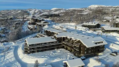an aerial view of a resort in the snow at Cozy Ground-Floor Apartment In Beitostølen in Beitostøl