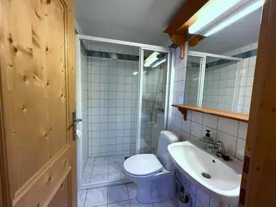 a bathroom with a toilet and a sink at Ideal Base For Exploring 2 Bedrooms & Balcony in Beitostøl