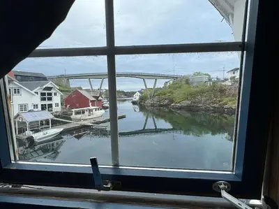 a view of a river from a window at Nautnes Coastal Haven in Nautnes