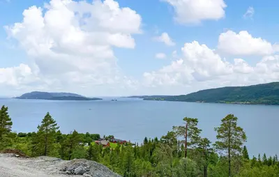 a view of a large body of water with trees at 3 Bedroom Amazing Home In Åfarnes in Åfarnes
