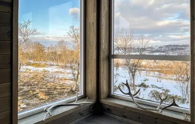 a window with a view of a snow covered field at Cozy Home In Ålen With Wifi in Ålen
