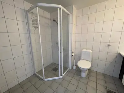 a bathroom with a shower and a toilet at Enjoy Scenic Views From Your Balcony in Beitostøl