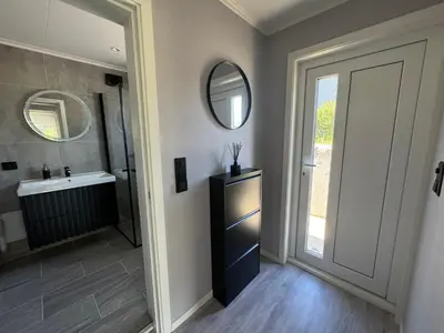 a bathroom with a sink and a mirror at Dalen Apartment in Stranda